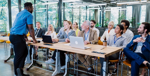 Employees participating in role-based end-user training to understand new systems and adapt smoothly to daily responsibilities.